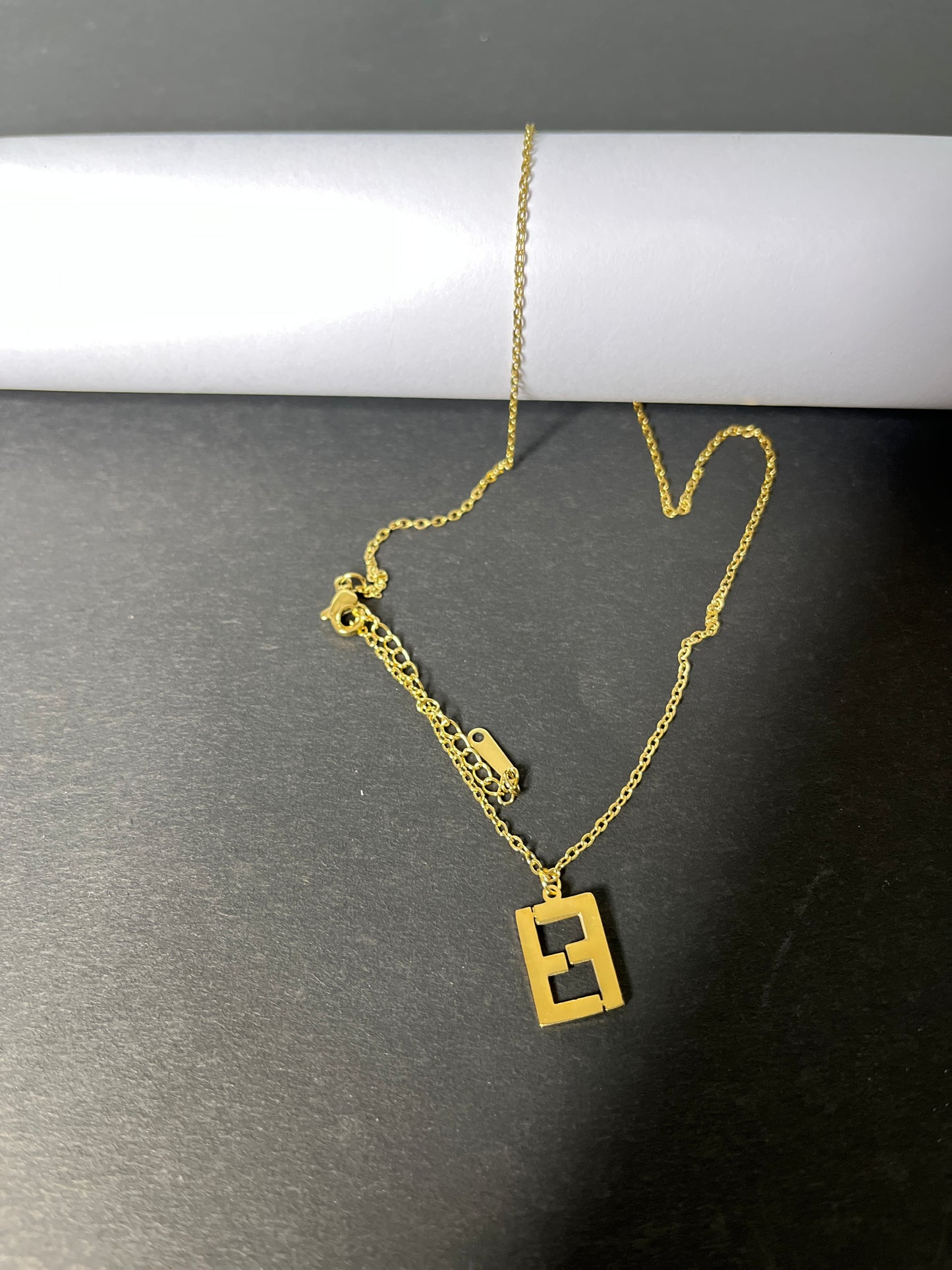 Faltufit's Elite Golden Logo Pendant