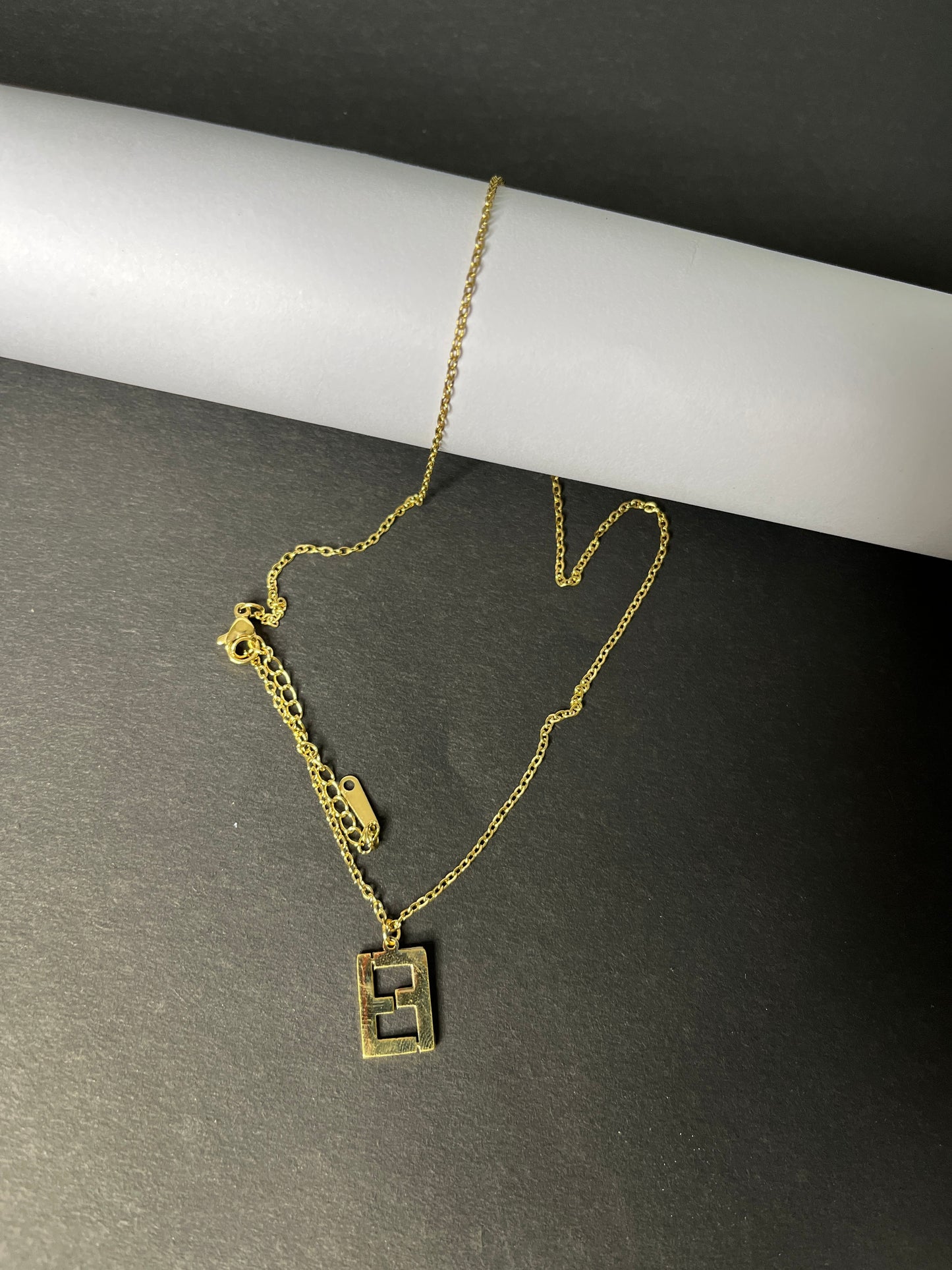 Faltufit's Elite Golden Logo Pendant